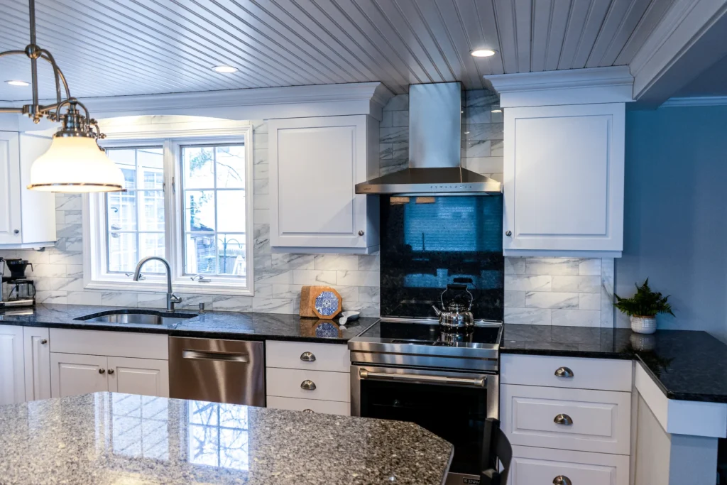 White Kitchen Cabinets. Black Countertops. An Unforgettable Home Remodel in Lexington, Massachusetts!